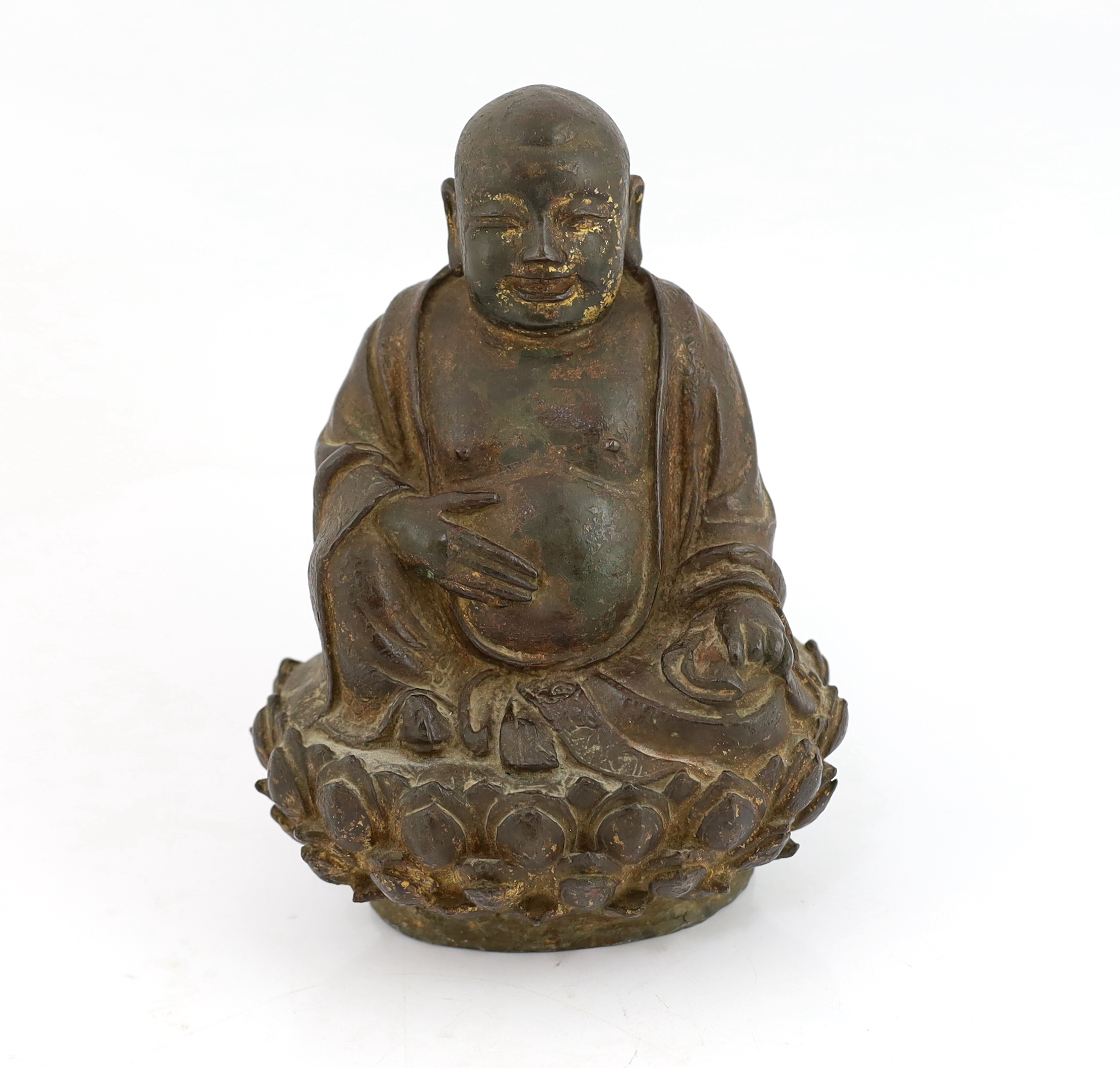 A Chinese lacquered bronze figure of Budai, late Ming dynasty, cracks and old repairs